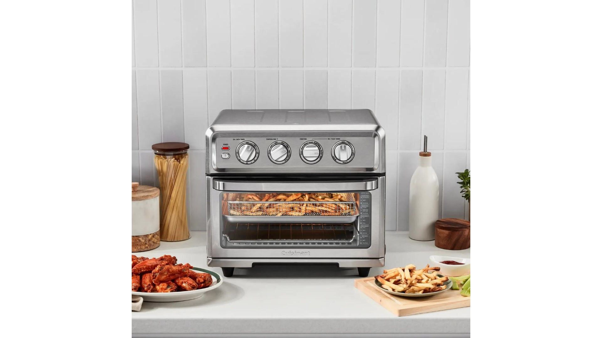 toaster oven air fryer with french fries and wings